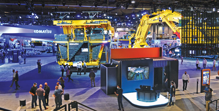 large machine in a hall with people